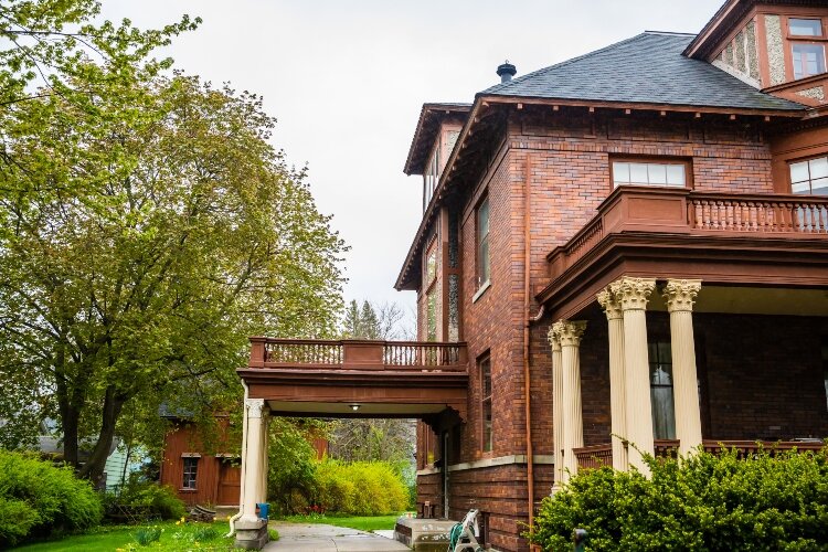 The carriage house at the rear of the property includes a turntable that allows cars to turn around inside, eliminating the need to back in or out of the driveway.