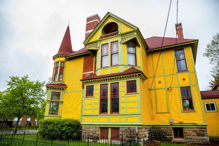 The home at 1315 Center Ave. is unique today for its vibrant color. When it was built in 1887, it was unique in that it didn’t come from lumber money. Instead, the original owner, Charles Whitney, held a variety of jobs, from a baker to a banker.