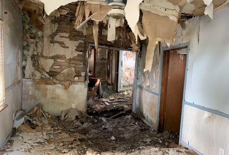 Homes that the Bay County Land Bank Authority sells typically have substantial problems. This one had to be torn that the Bay County Land Bank Authority sells typically have substantial problems. (Photo courtesy of the Bay County Land Bank Authority)