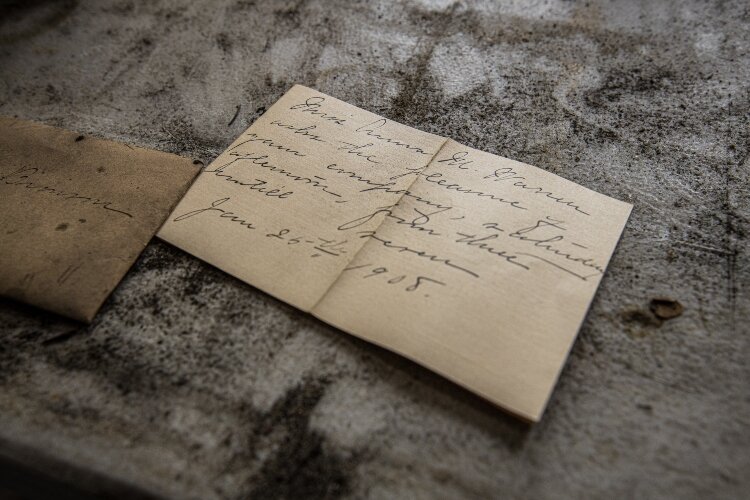 The Frosts have un-covered surprises while renovating this home. Artifacts, including a handwritten note from 1908, were hidden under a knot in a floorboard.