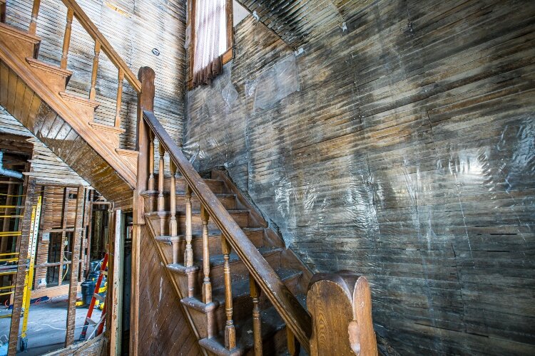 A grand staircase stretches from the main entrance to the second floor of the 620 N. Grant St. home.