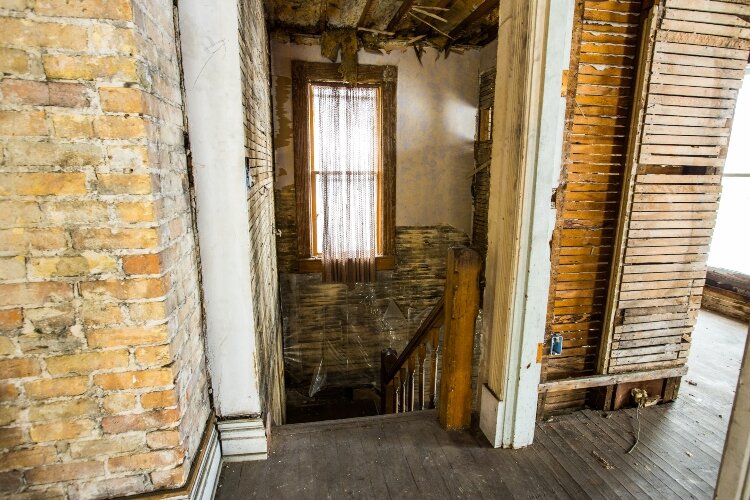 While restoring the home, Joe has learned that Emmet Holcomb was a city councilman who advocated city parks and sidewalks. 