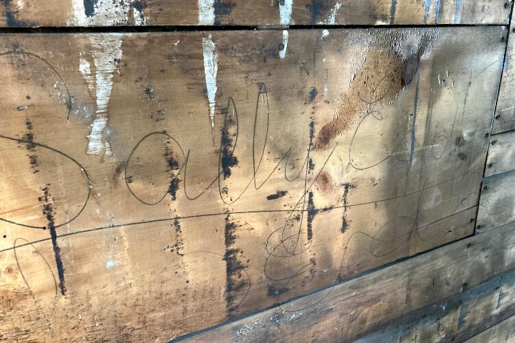 In Newell Eddy’s addition, the Hofmanns discovered the Eddy children had signed their names behind the wall panels. (Photo courtesy of Katie Bruessow- Junie B. Photograpie)