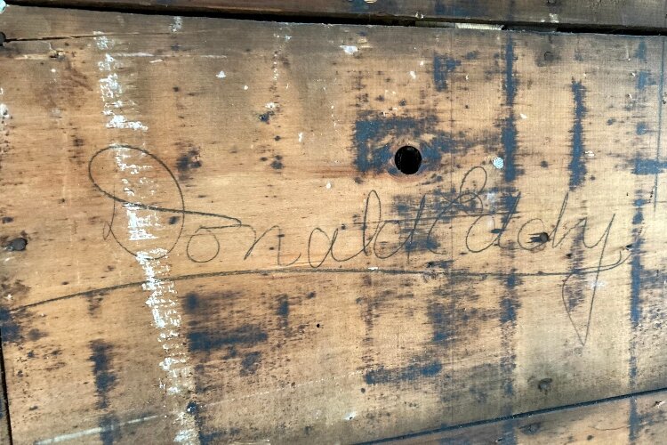 The Hofmann children likely will continue the tradition and sign the wall before drywall is installed. (Photo courtesy of Katie Bruessow- Junie B. Photograpie)
