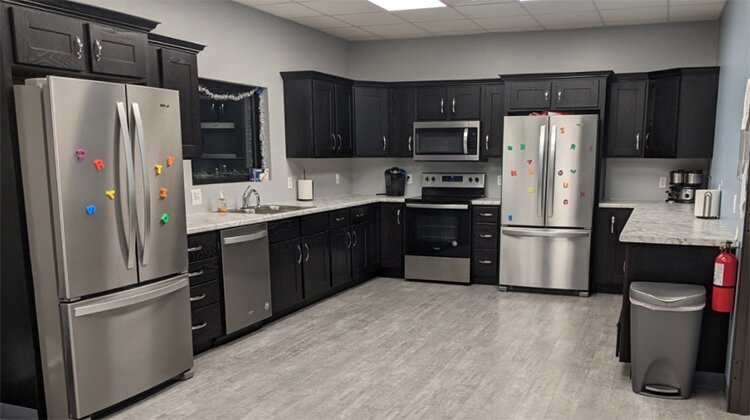 The full-size commercial kitchen is used to teach chores and vocational skills. It doubles as an area to do science experiments.