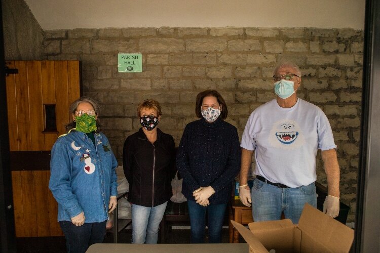 Volunteers from left are Janet Olson, Valerie Cross, Heidi Prince, and Bob Cross.