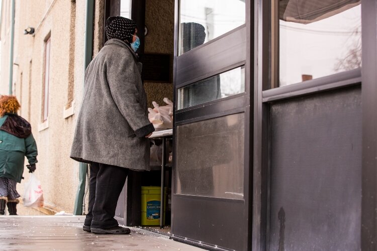 Prior to the pandemic, diners were invited inside to visit with one another before the meal. Now, all the meals are served to go to limit potential exposure to COVID-19.