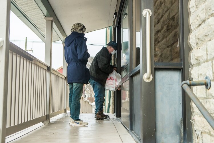 Between 10 and 15 volunteers are needed to prepare and serve food before cleaning up.
