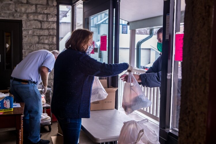 The volunteers say they benefit as much from the program as the people who receive the food.