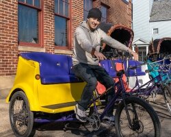 Cory Christopher opened Bayside Buggies this spring, offering downtown shoppers and diners open-air rides around the district.