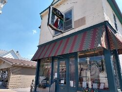 Bill Keipert and his 94-year-old mother, Virginia, provide alterations inside J-B Men's Apparel.