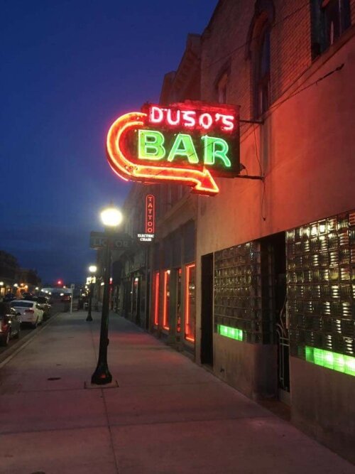 While the inside of Duso’s Bar is re-modeled, the new owner kept the classic neon sign and glass block exterior.