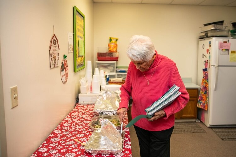 Hardy takes a slice of dessert. Area churches and other organizations provide dinner for the volunteers at the clinic every Wednesday.