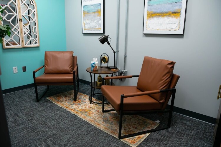 A social worker is available for conversations once a week inside a quiet room at the center.