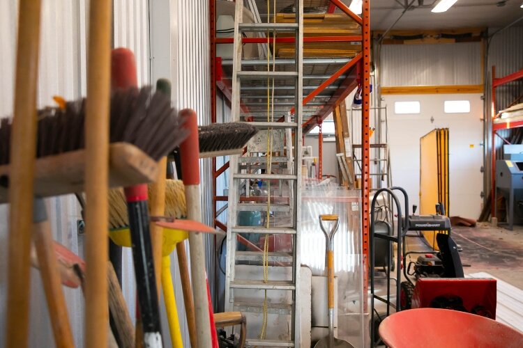 The metal shop is crowded with donated equipment and materials, but storage sheds are on the way to make more room.