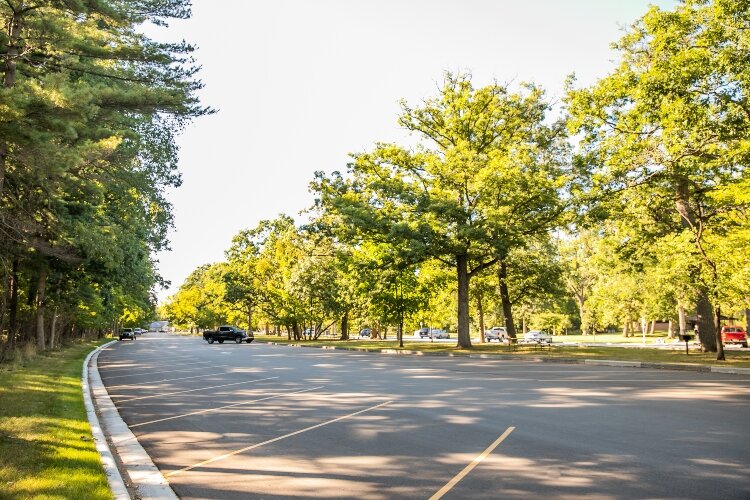 The park recently upgraded its parking lot, adding new parking spaces closer to the playground and spray park. It also created a sidewalk for safer pedestrian traffic, bus parking, and drop-off zones.