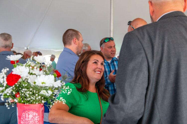 Bay Area Chamber of Commerce President & CEO Magen Samyn mingles with other guests before the ribbon-cutting ceremony.