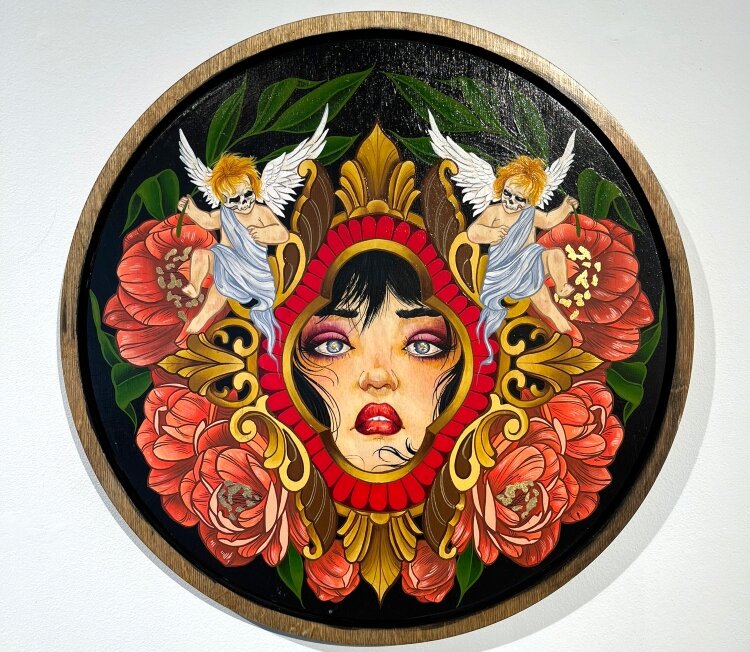 The work of artist Jordan Taylor of Black Ball Tattoo also was on display. This one is called Purgatory.