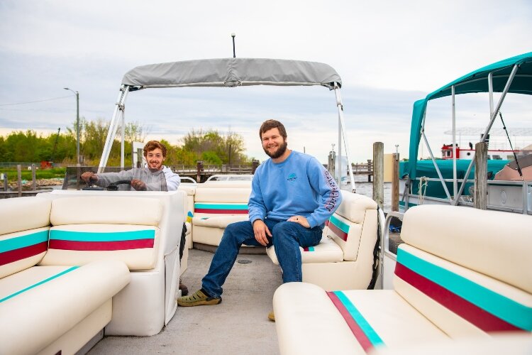 Jared Greshow (left) and Jonah Joppich (right), friends for nearly 30 years, founded Bay City Boat Rental together.