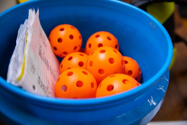 Minimal equipment is needed to try pickleball. At the Bay Area Family Y and Bay County Community Center, equipment is available for new players to rent or borrow.
