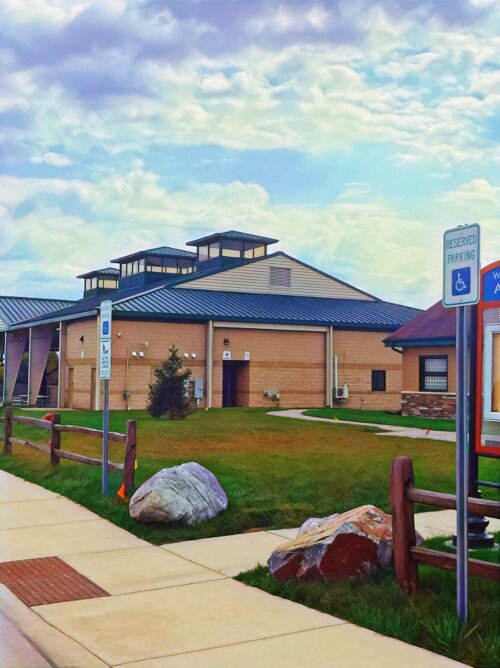 The pavilions, ponds, and playscape inside Auburn City Park, located on Nine Mile Road (also known as South Auburn Road), are visible from US-10.