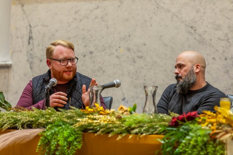 Scott Ellis makes a point while fellow panelist Phil Eich listens.