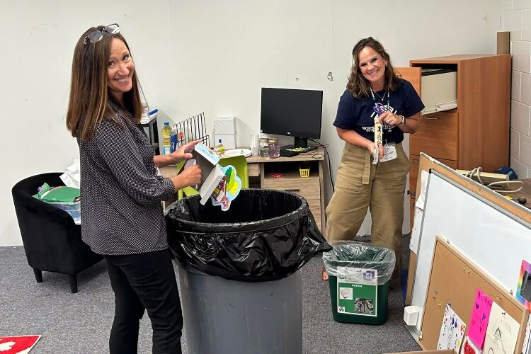 Executive Director Lynn Pavlawk, at left, works with Office Manager Julie Garcia to clear the club before renovation work began in August. The Bay City branch of the club was closed about a month for the work.