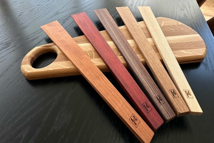 Hescott says he likes to let the color and grain of the wood shine through in his furniture. He also favors clean lines for his designs.